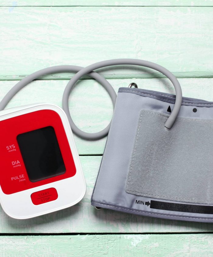 Blood Pressure Monitor Blood Pressure Monitor on Wooden Background
